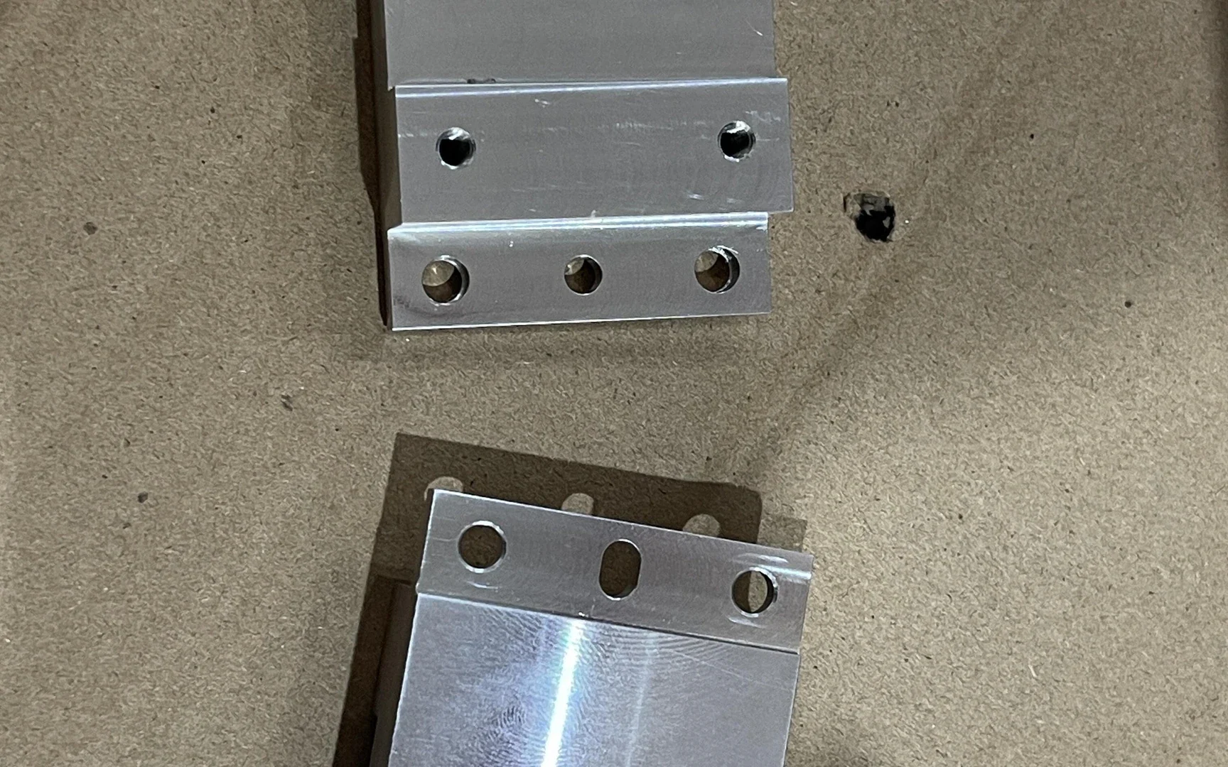 Anodized aluminum packaging line integrator mounts and machine mounting brackets