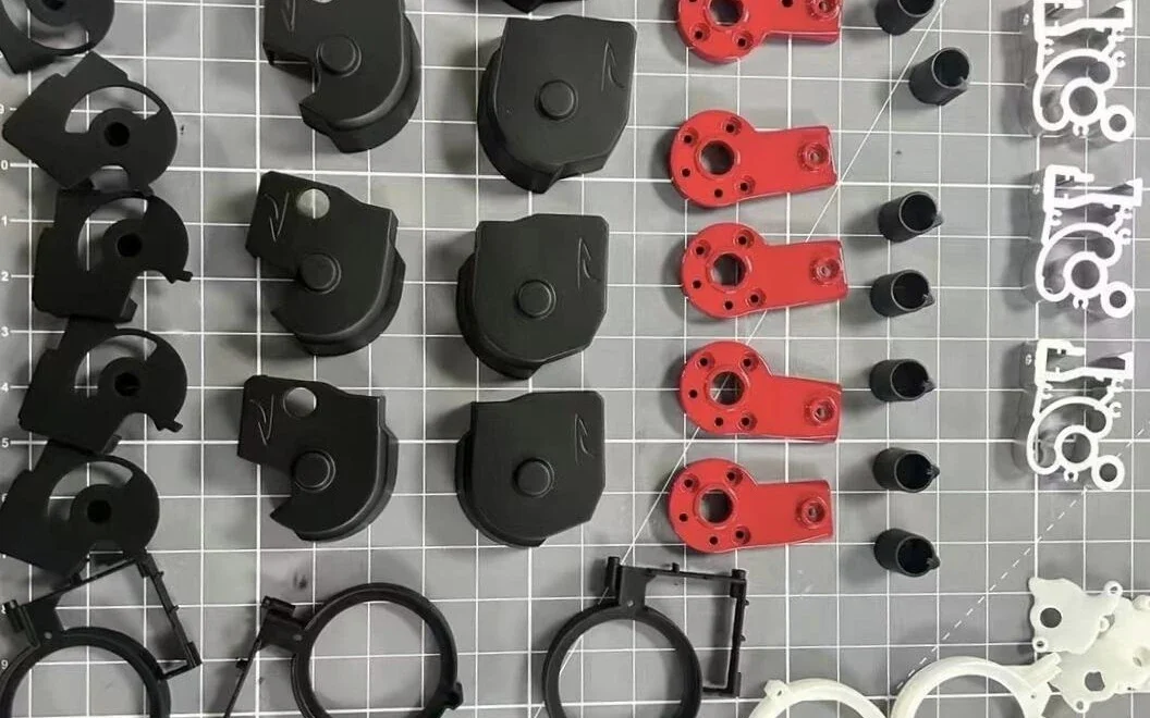 DLC-coated wear track and cutter mounts assembly with dark DLC surface finish
