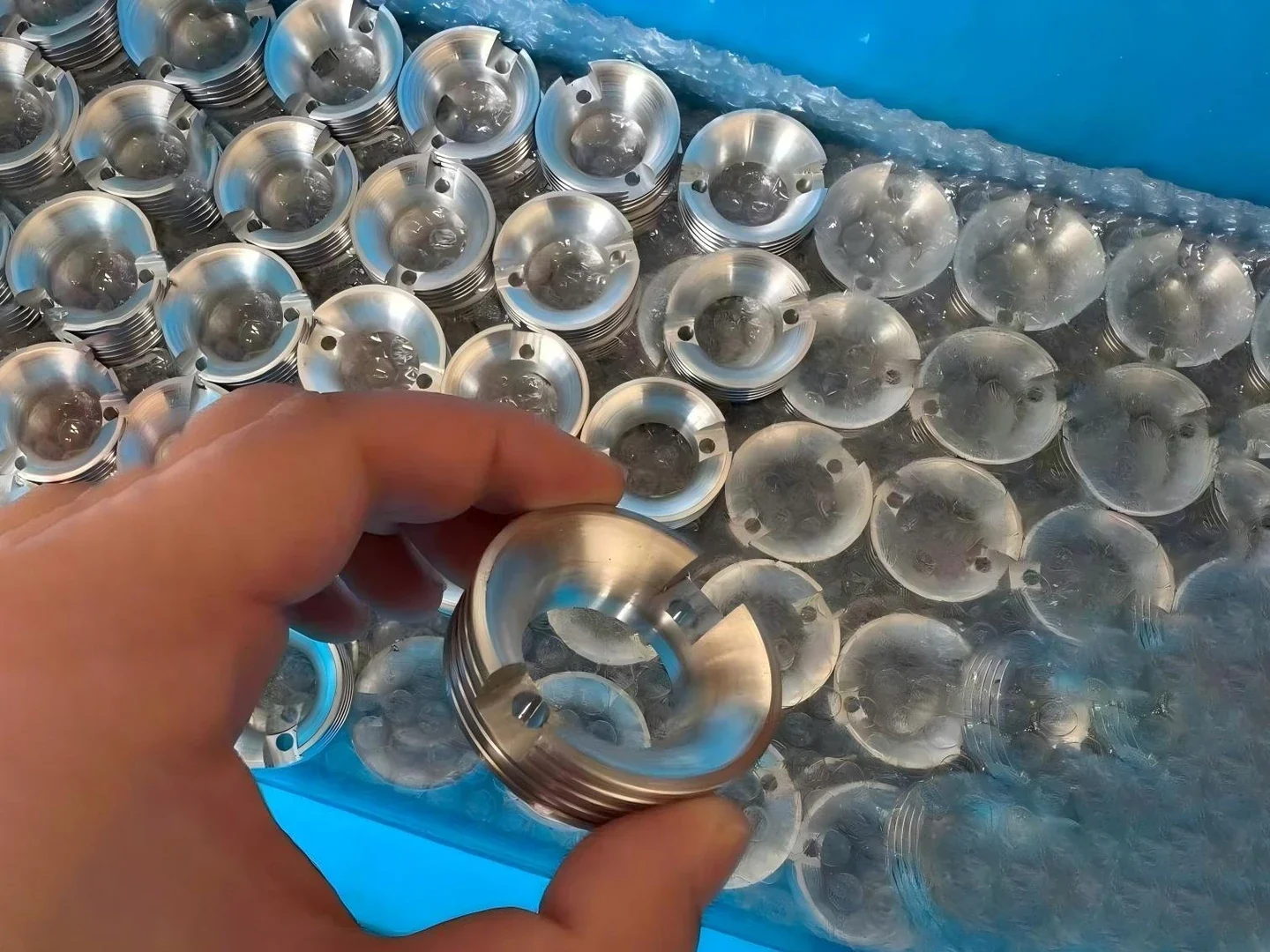 Sanitary surface finishing for food-grade packaging machinery components